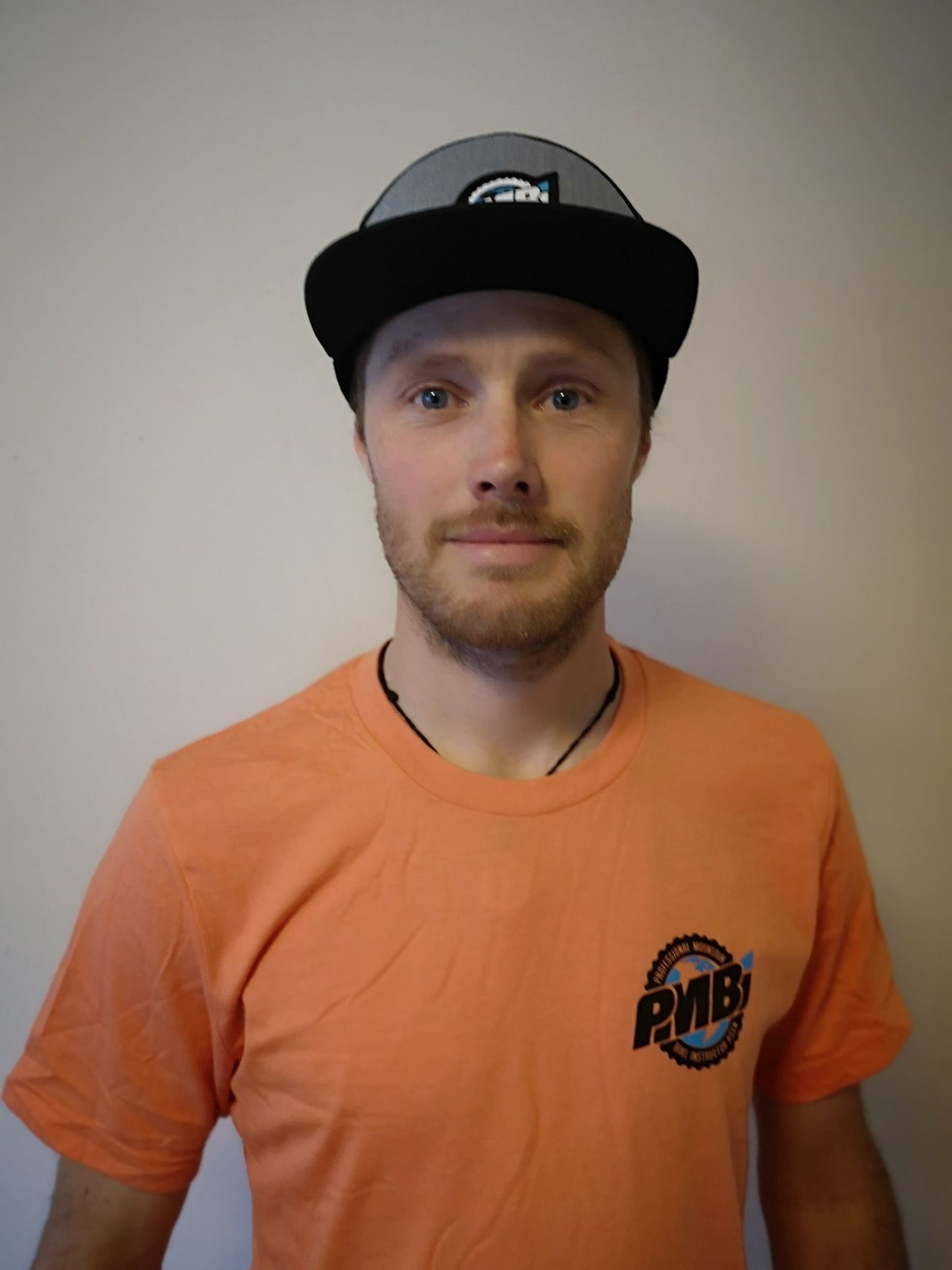 ORANGE HEATHER PMBIA MEN T-SHIRT (OLD LOGO)